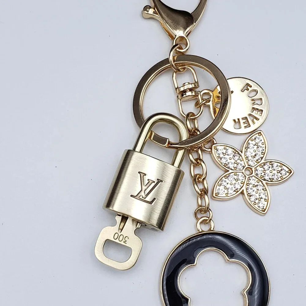 Authentic Louis Vuitton Lock & Key with Unbranded Flower Charm, Keychain